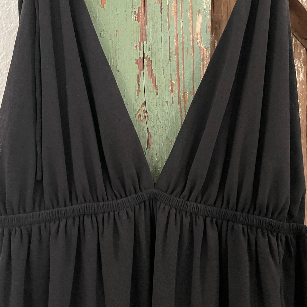 Beautiful long black dress. Slit on side. Worn once for special dinner.
